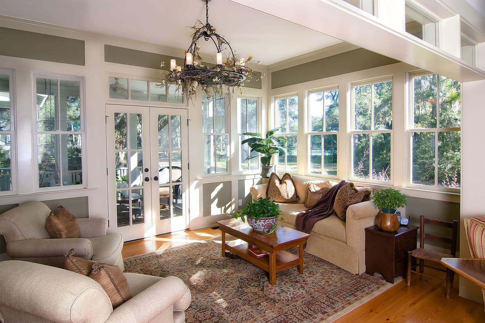Furnished Sunroom With Large Window