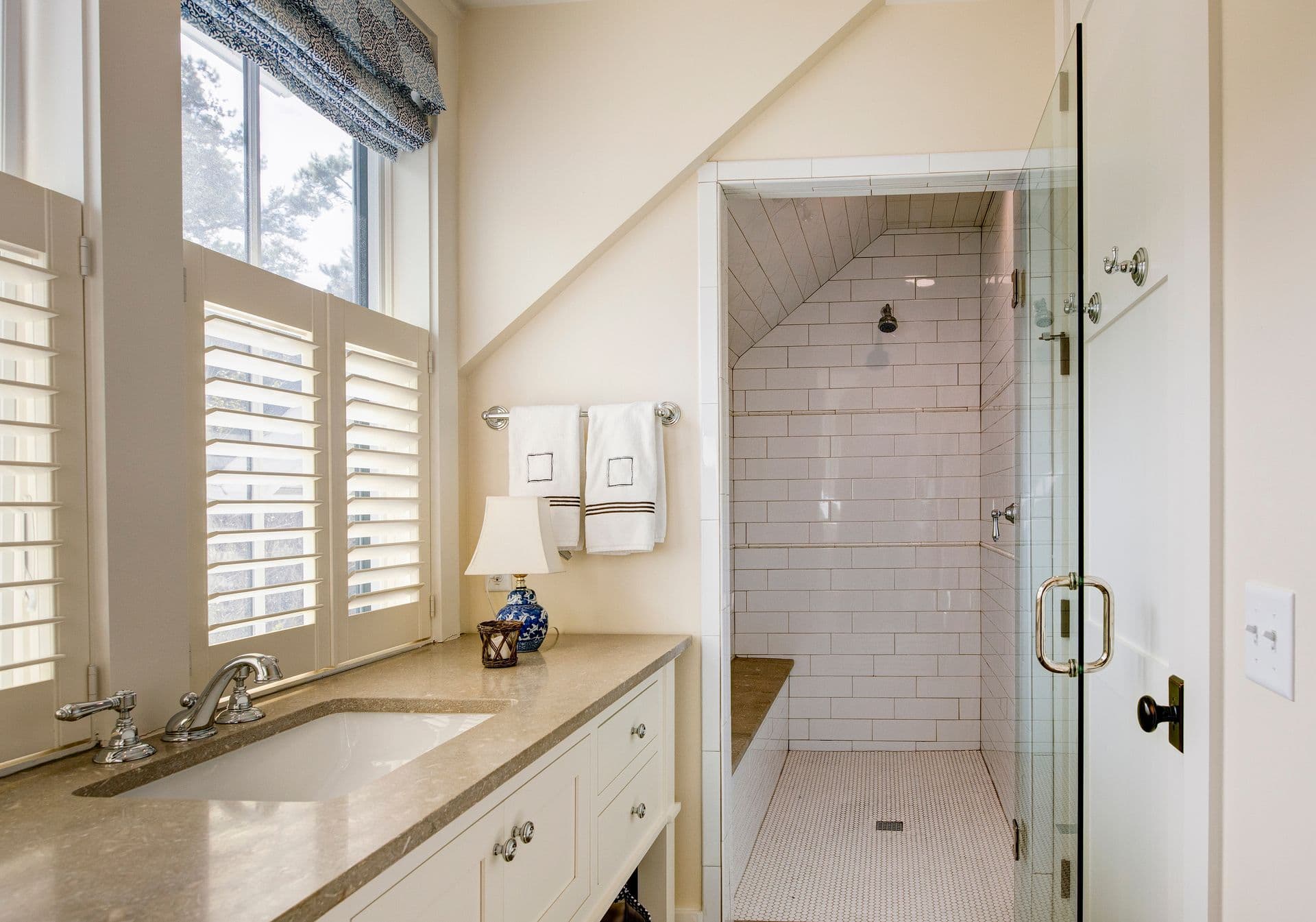 Bathroom interior with beautiful tile wheelchair accessible shower.