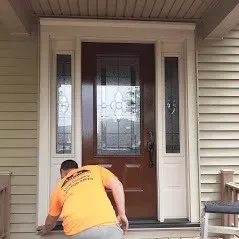 Contractor-completing-door-replacement-job-in-Lancaster-PA
