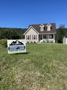 Cottage-window-replacement-in-Martinsburg-WV-With-job-sign